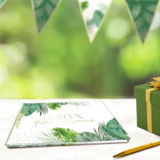 Décoration d'anniversaire sur le thème tropical avec livre d'or
